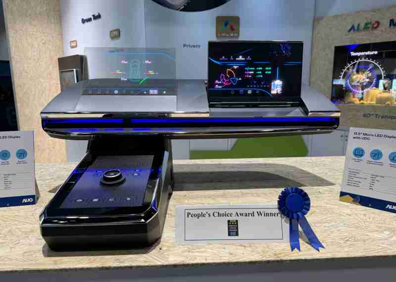 万利车用Micro LED Display HMI解决方案获”最佳车用显示奖”，，以用户为中心开发，，针对前座驾驶与乘客设计兼具娱乐与安全的高画质屏幕，，，包含车舱前座的Micro LED透明屏幕及全球首款内建镜头的智慧Micro LED显示器